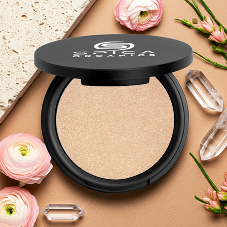 Luxury organic highlighter powder texture showing light-refracting minerals and buildable radiance by Spica Organics