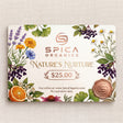 Spica Organics gift card with nature-themed design on a textured beige background