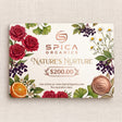 Spica Organics gift card with floral design on a textured beige background