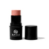 Spica Organics makeup stick with pink shade on a white background