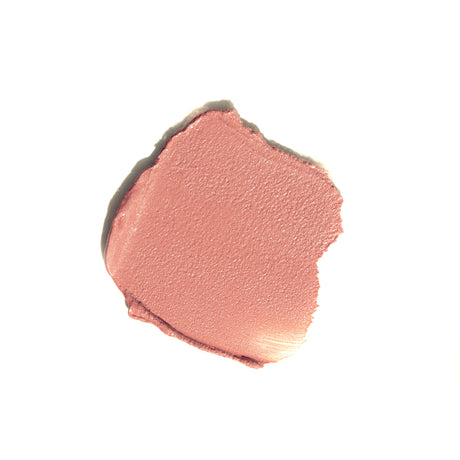 Pink makeup swatch on a white background